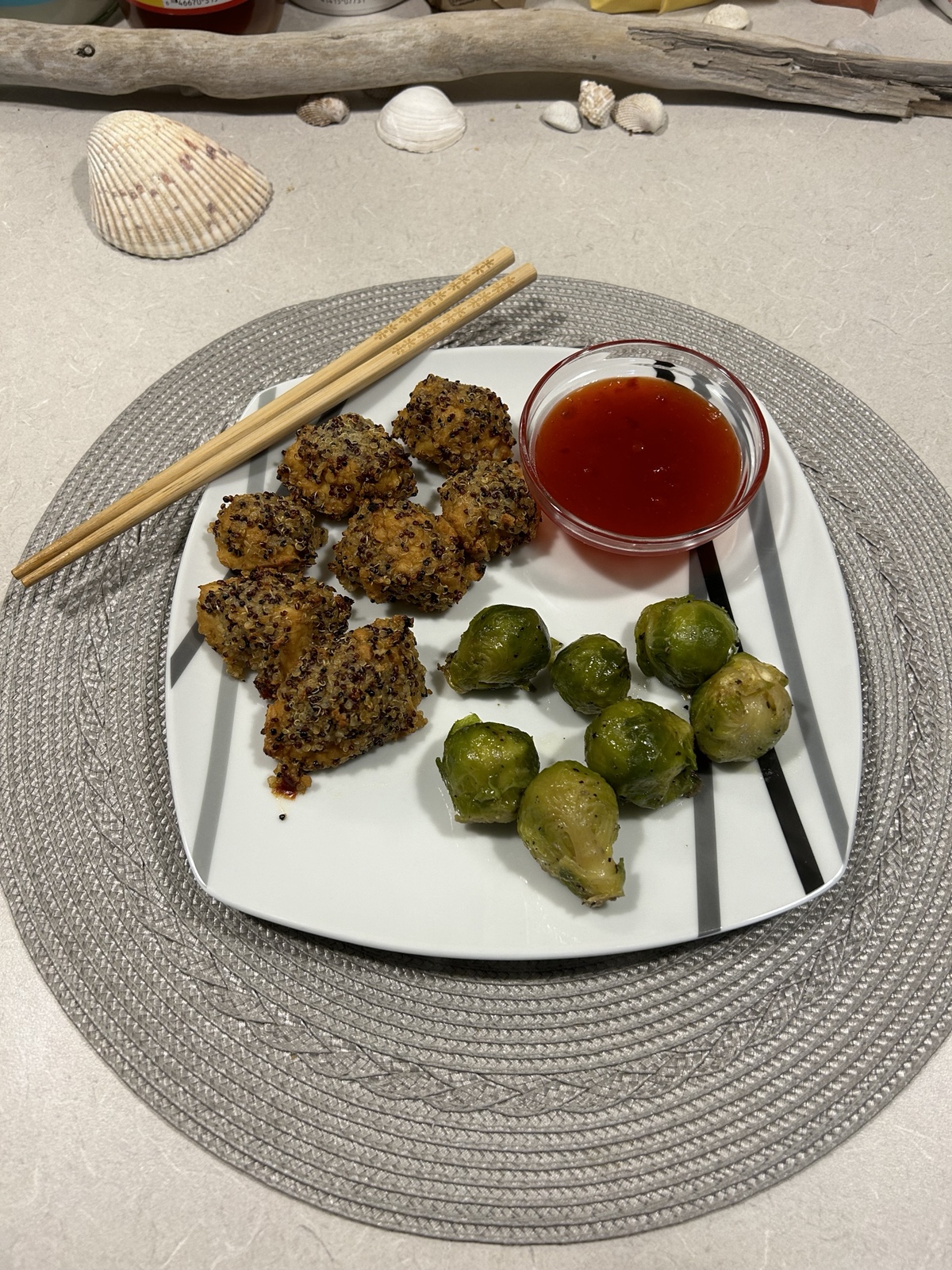 Quinoa crusted tofu nuggets and Brussel sprouts with sweet and sour sauce