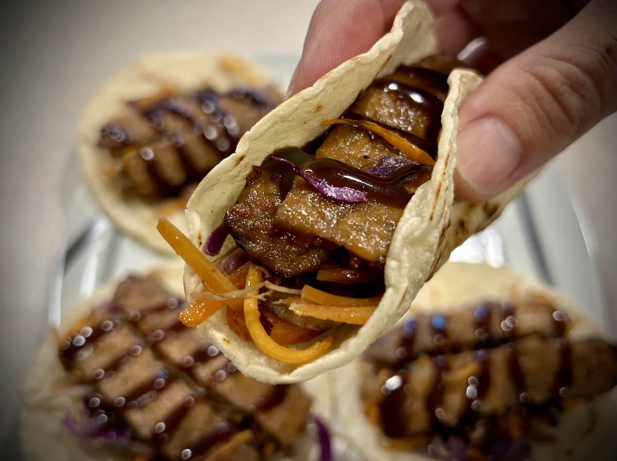 Close up of a taco in hand