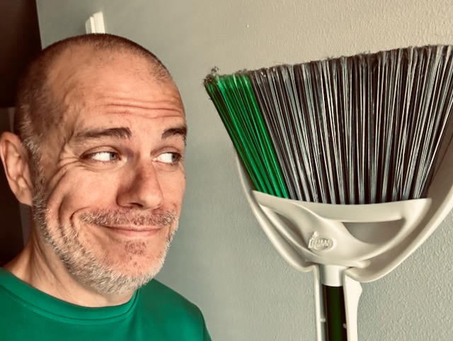 Selfie with a broom and dustpan