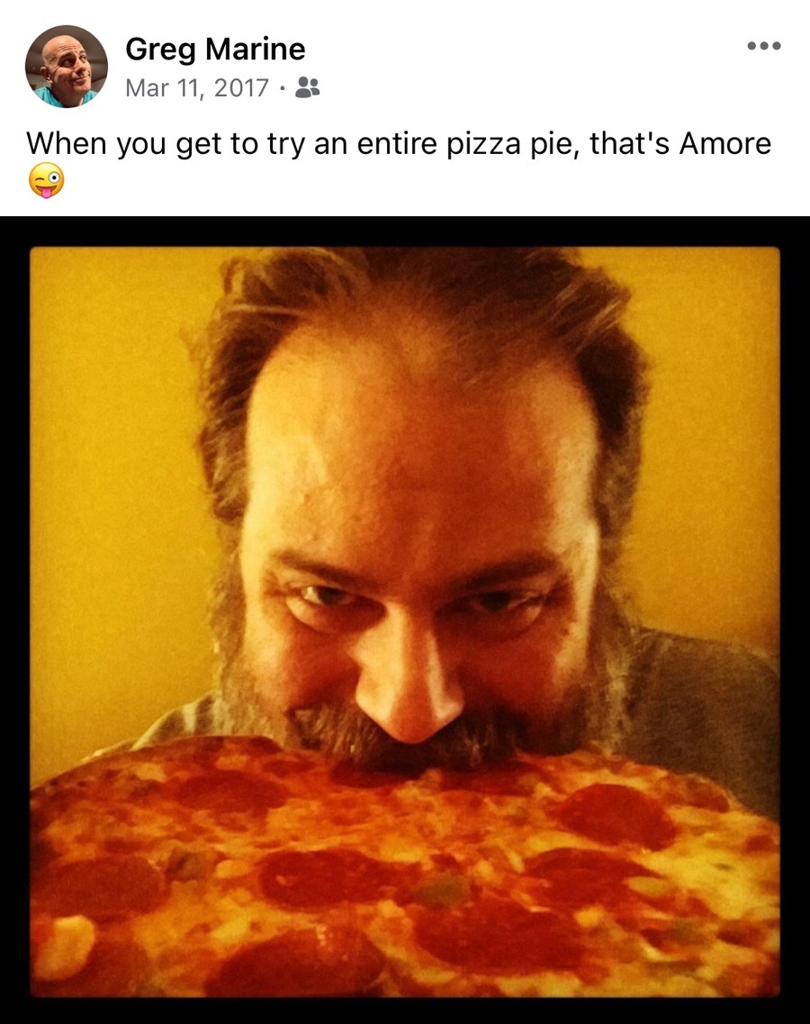 Old Facebook post screenshot of a selfie where I appear to be eating an entire pizza. The caption reads, "When you get to try an entire pizza pie, that's Amore"