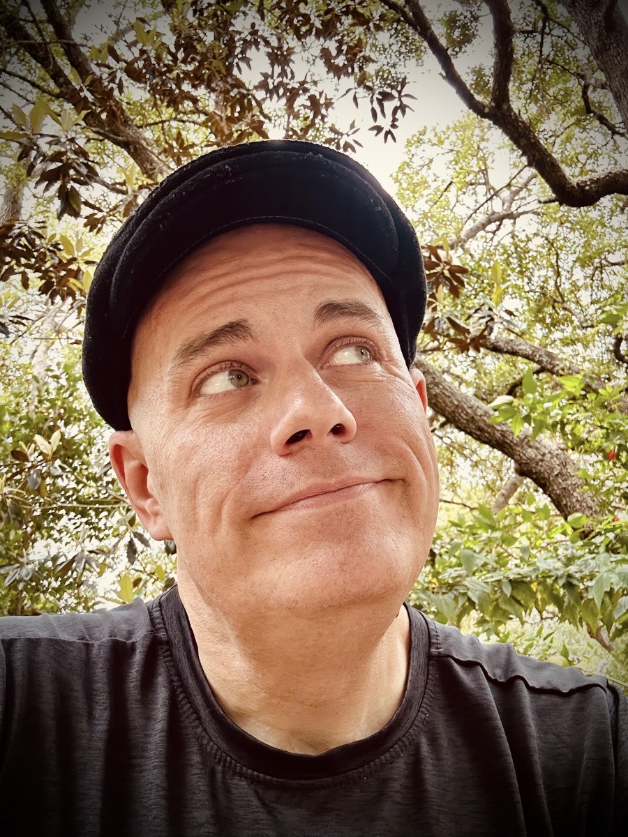 Selfie looking up and off into the distance